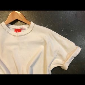 Cream basic tee with open design neck